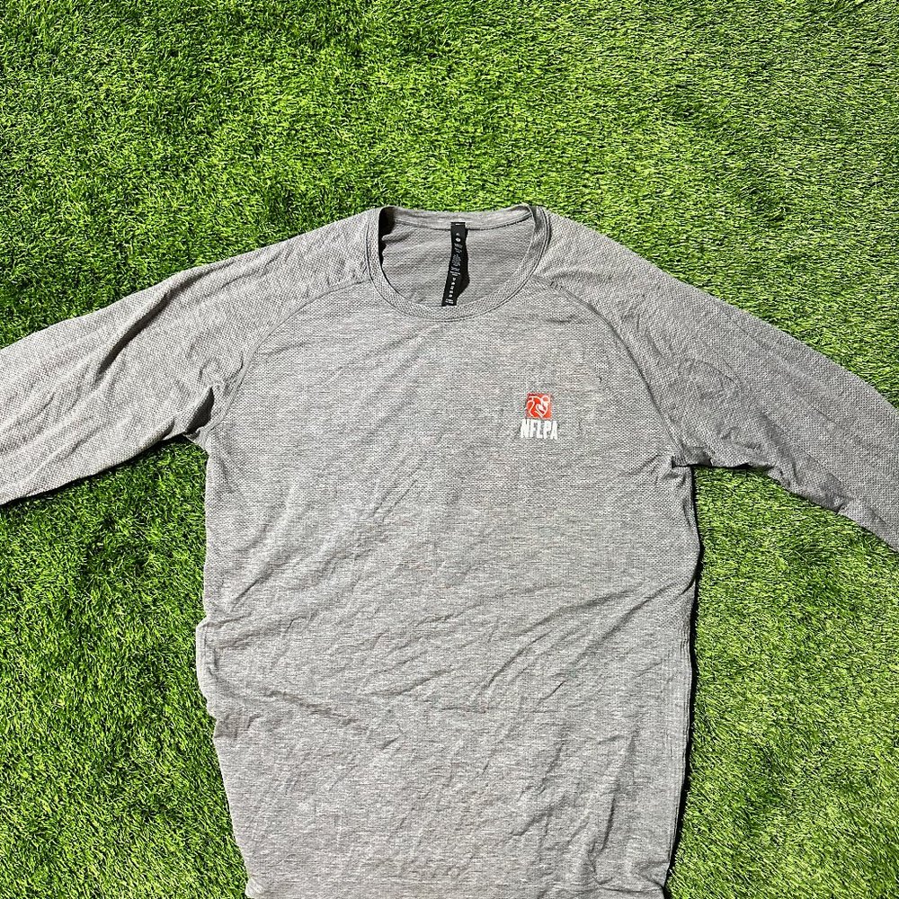 grey Lululemon NFLPA authentic long sleeve shirt.